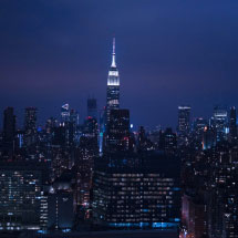 Empire state building at night with lights
