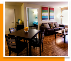 an attractive dining and living area in an apartment