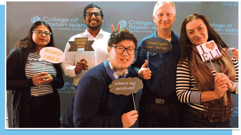 diverse group of people holding encouraging signs