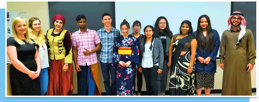 a group of young people in traditional clothes from various cultures