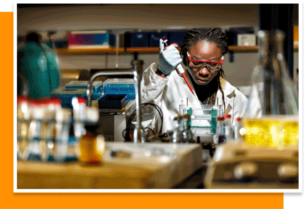 a black woman working in a medical lab